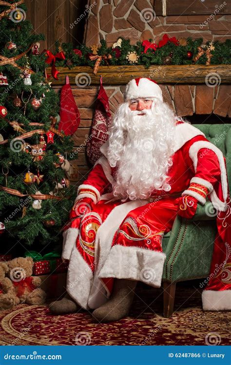 Cheerful Santa Claus Sitting At His Chair Stock Photo Image 62487866