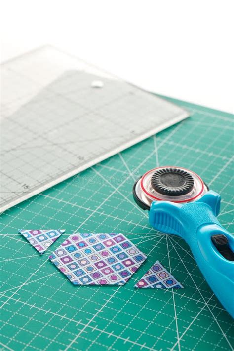 The Process of Cutting Pieces of Fabric in the Shape of Hexagons To Create a Quilt Stock Image ...