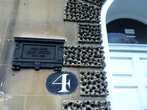 The Number Four Is Placed On The Side Of A Building With Decorative