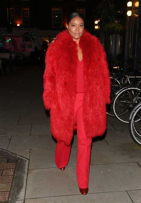 Gabrielle Union in a Red Fur Coat Arrives at the Chiltern Firehouse in ...