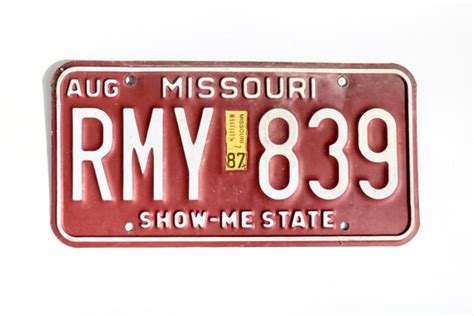 Missouri License Plate Show Me State RMY839/Red by AmericanAntique