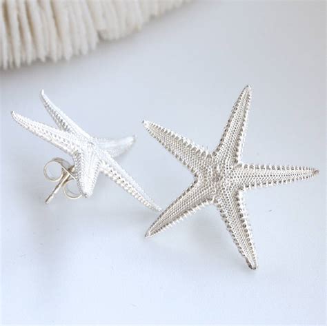 Sterling Silver Starfish Earrings By Caroline Brook