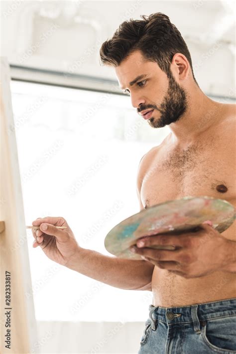 Sexy Shirtless Man Drawing With Brush And Holding Palette Stock Photo