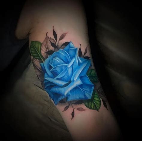 Blue Rose Tattoo Blue Rose Tattoos Rose Tattoo Design Rose Hand Tattoo