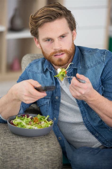 Glad Smiling Handsome Man Holding Plate With Salad Stock Photo Image