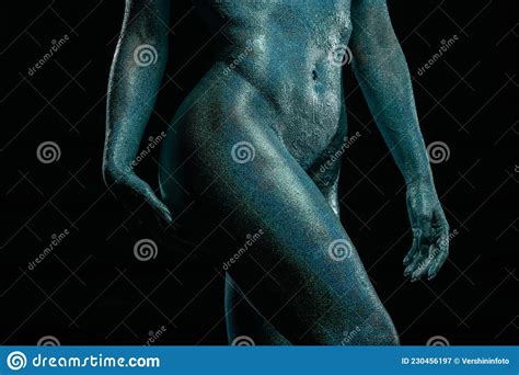 Gorgeous Naked Brunette Posing Painted In Turquoise Sequins Stock