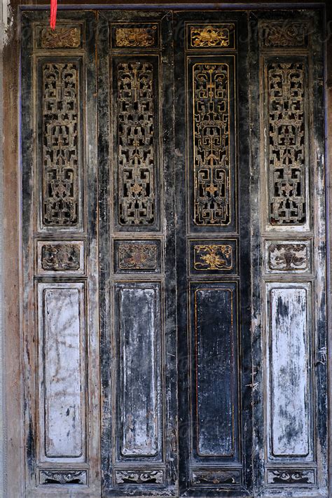 Chinese Style Wood Carving Door In Ancient Building By Stocksy Contributor Chaoshu Li Stocksy