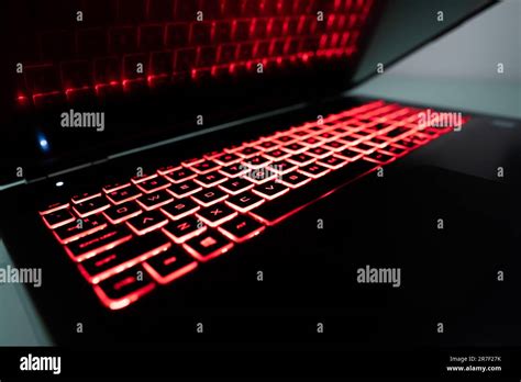 Gaming laptop keyboard with led red light Stock Photo - Alamy