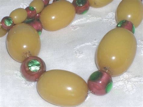 Antique Bakelite Peacock Eye Foil Bead Necklace Rare Gem