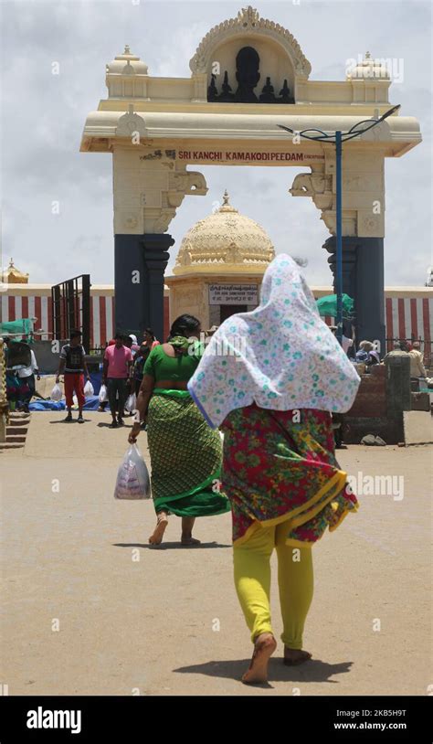 Hindu Devotees Walk Towards The Entrance To The Sri Adhi Sankarar