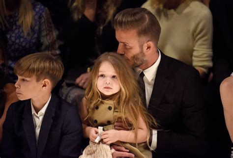 Harper Beckham, Victoria Beckham, David Beckham at Burberry Fashion ...