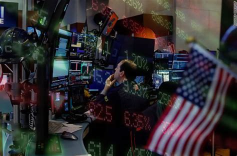 Wall St Berakhir Turun Karena Powell Merencanakan Kenaikan Suku Bunga