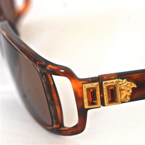 Versace 1970s Faux Tortoise Shell Sunglasses With Open Sides And Accents On Arms Italy Quiet West