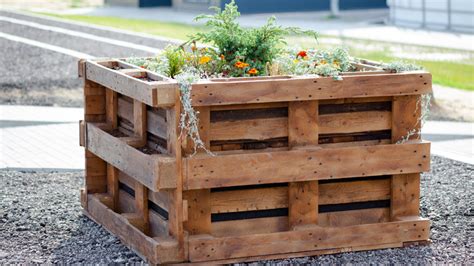 Upcycle Wooden Pallets To Make The Ultimate Raised Garden Bed