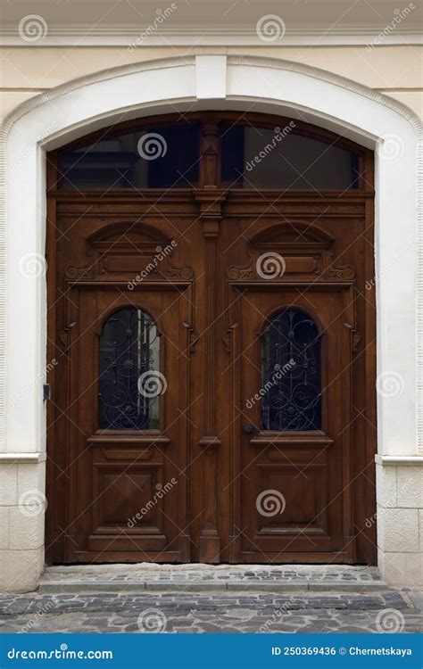 View of House with Beautiful Arched Wooden Door. Exterior Design Stock ...