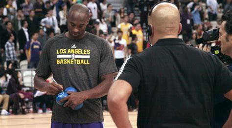 Kobe Bryant Signs Autographs For Opponents As His Career Winds Down