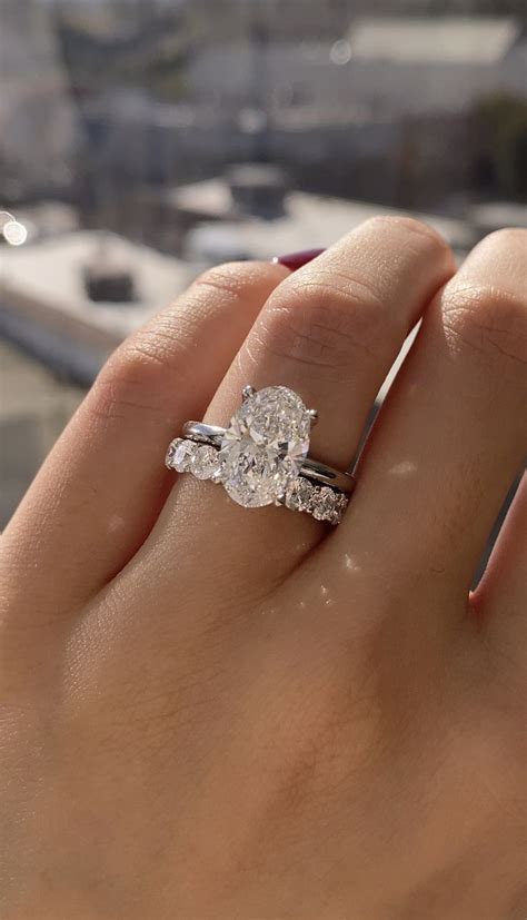 Ct Oval Diamond Ring In Platinum Paired With Our Round Eternity