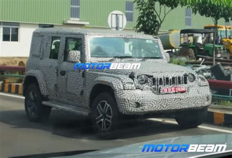 Mahindra Thar 5 Door Spied With New Alloy Wheels Pilot On Wheels