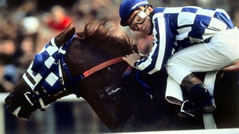 Secretariat. Jockey (Ron Turcotte) couldn't resist a quick glance at ...