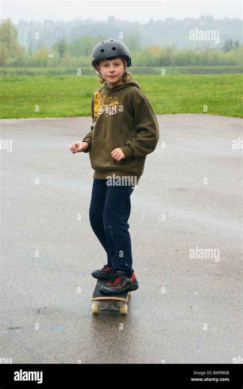 child skateboarding with helmet Stock Photo - Alamy