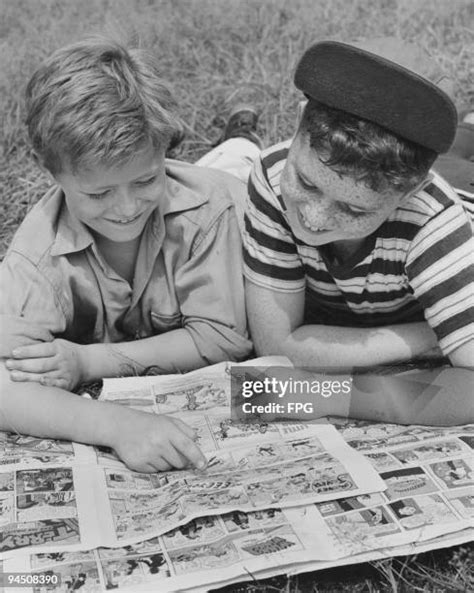 Children Reading Comics Photos And Premium High Res Pictures Getty Images