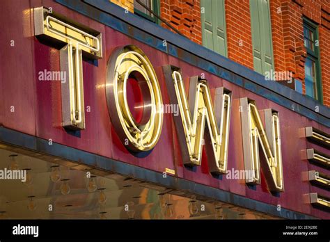 Old neon movie theater sign Stock Photo - Alamy