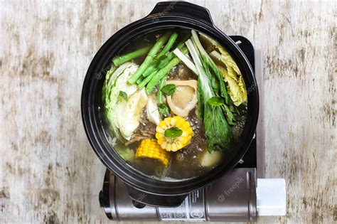 Premium Photo | Bone Marrow Bulalo Soup with corn and vegetable served in a bowl isolated on ...