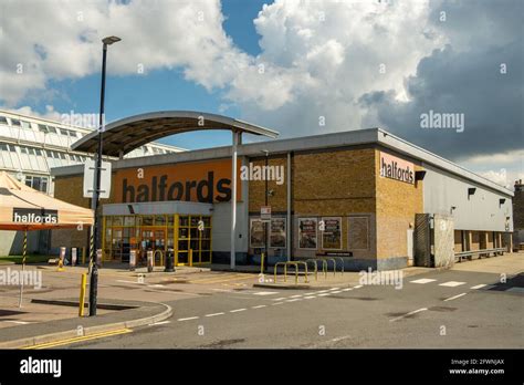 LONDON: Halfords store exterior. A large British retailer of car parts ...