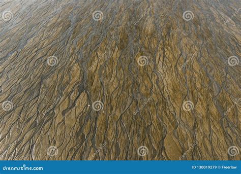 Ripple marks on sand beach stock image. Image of beach - 130019279