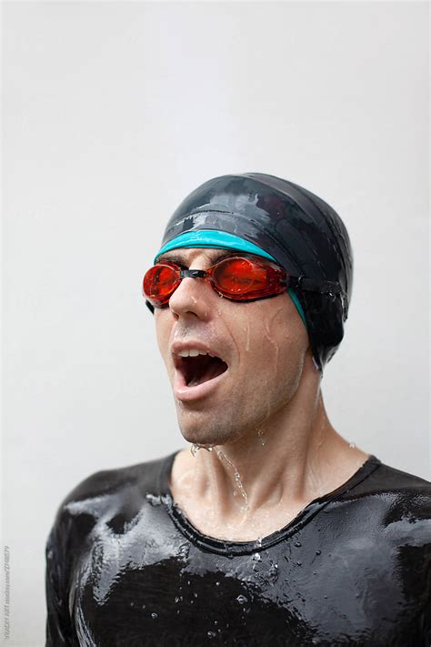 "Swimmer In Red Glasses" by Stocksy Contributor "Vradiy Art" - Stocksy