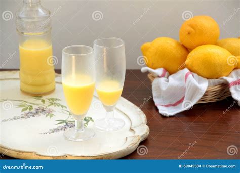 Glasses Of Crema Di Limoncello Bottle And Lemons Stock Photo Image