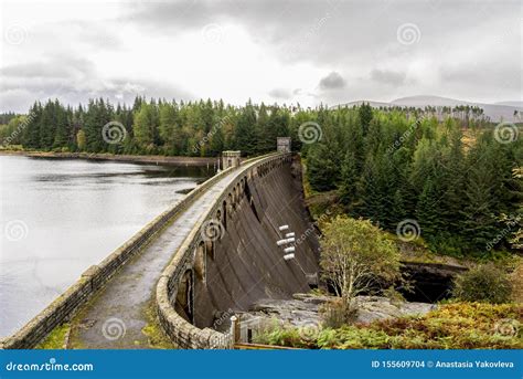 A View Of Laggan Dam With 6 Pipes To Release Water From The Loch To