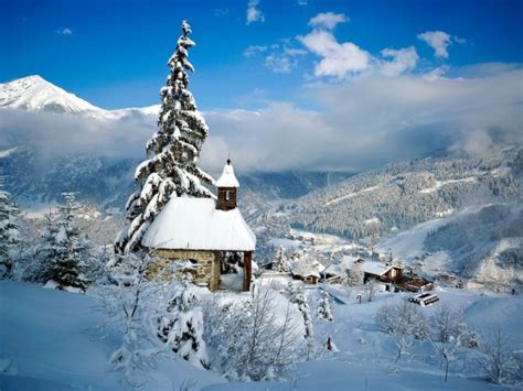 Overview of snowy European village - Photorator