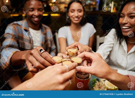 Young Multiracial Group Of Friends In Casual Clothing Doing Celebratory