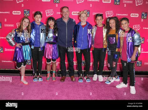 New York, NY - November 4, 2018: KIDZ BOP Kids Olivia, Shane, Julianna, President Victor Zaraya ...