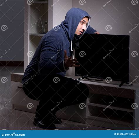 Burglar Thief Stealing Tv From Apartment House Stock Image Image Of