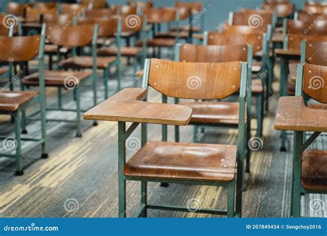 Wooden Lecture Chairs Arranged In The Classroom Empty College Classroom With Many Wooden