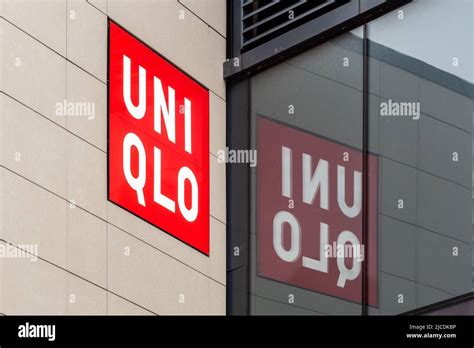 UNIQLO sign and logo on the side wall of the Manchester Market Street ...