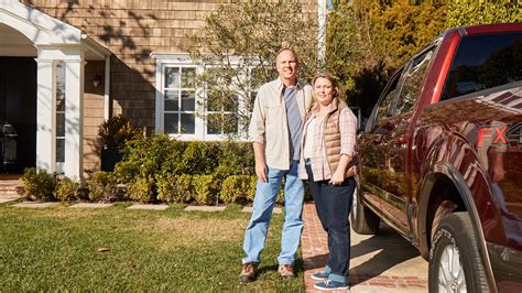 Couple outside, truck, house