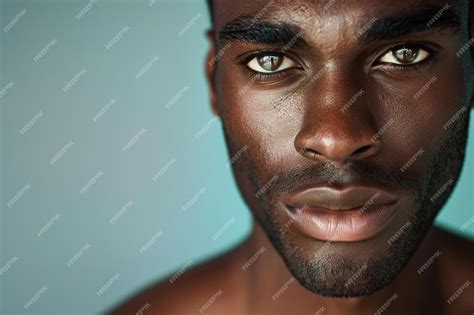 Premium Photo Close Up Portrait Of Handsome African American Man Staring