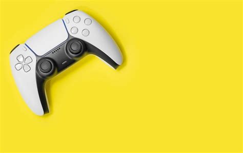 Premium Photo Next Gen Game Controller On Yellow Background