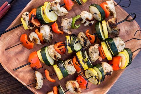 Top View Of Shish Kebab With Grilled Veggies And Chicken Stock Photo