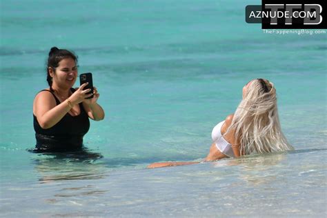 Kim Kardashian Sexy Seen Showing Off Her Hot Figure In A White Bikini