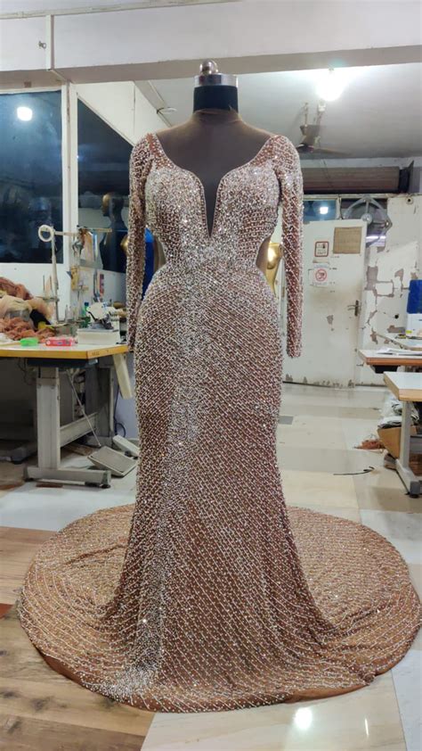 A Nude Plus Size Long Sleeve Beaded Evening Gown For Sale