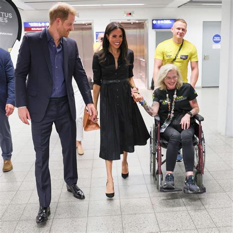 Meghan Markle And Prince Harry Enjoy Intimate Hug And Pose For Selfies