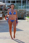 SWIMWEAR Imogen Thomas Showing Off Her Curves In A Bikini Next To The