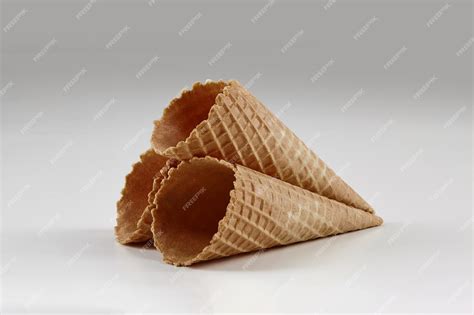 Premium Photo Three Empty Crispy Wafer Cones For Ice Cream Isolated