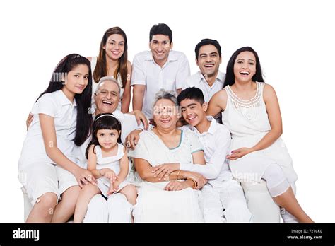 indian group Joint Family sitting sofa enjoy Stock Photo - Alamy