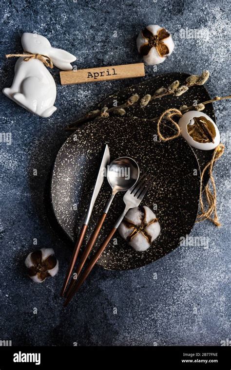 Festive Table Setting For Holiday Easter Dinner Decorated With Boxwood And Willow Pussy On Stone