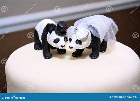 Black And White Panda Cake Toppers On The Wedding Cake Stock Photo